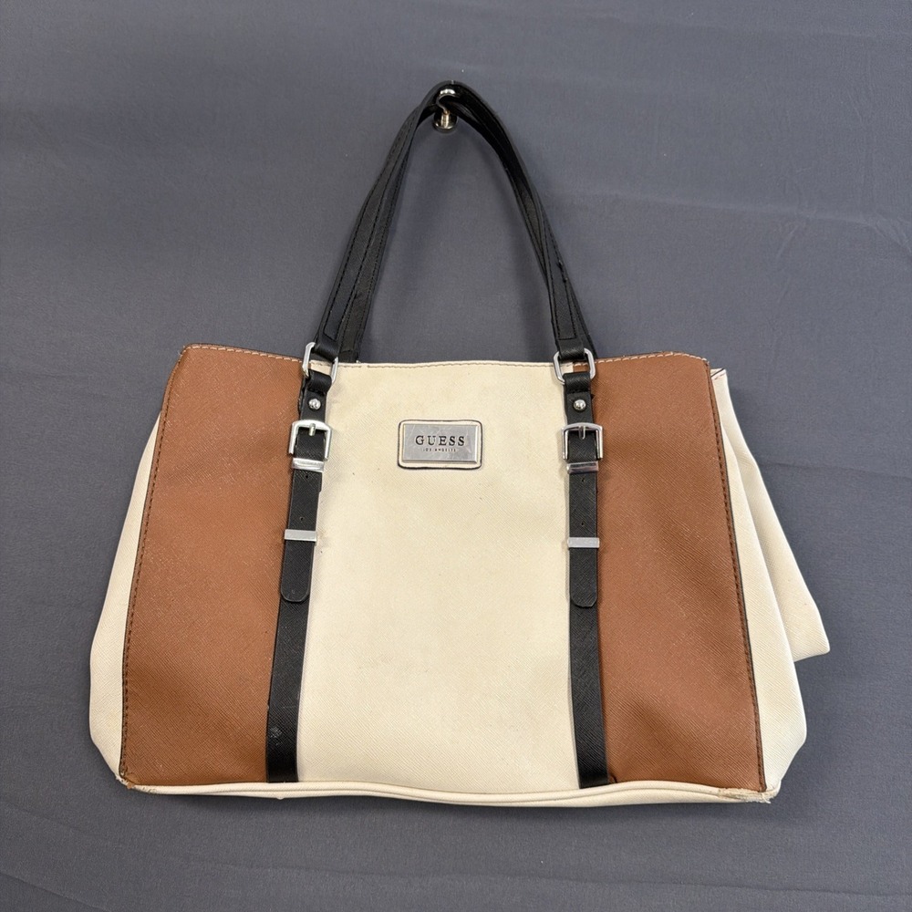Guess Central tote bag features a distinct color-block design in beige